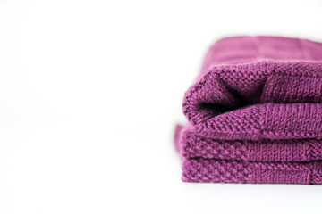 Handmade purple plaid on white background. Copy space.