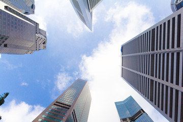 Bottom view of Skyscraper and blue sky background