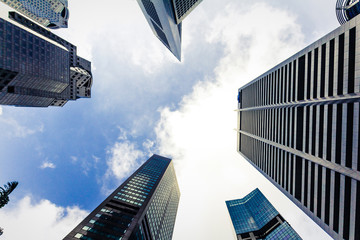 Bottom view of Skyscraper and blue sky background