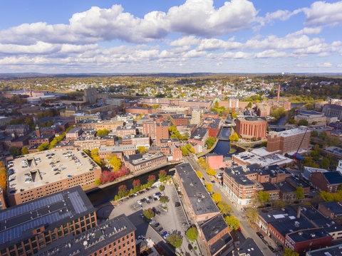 Lowell historic downtown, Canal, Marrimack River and historic Mills aerial view in fall in Lowell, Massachusetts, MA, USA. © Wangkun Jia