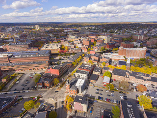 Lowell historic downtown, Canal, Marrimack River and historic Mills aerial view in fall in Lowell, Massachusetts, MA, USA.
