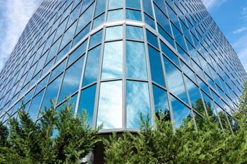 Glass building exterior design and detail. Abstract architectural design of glass building. 
