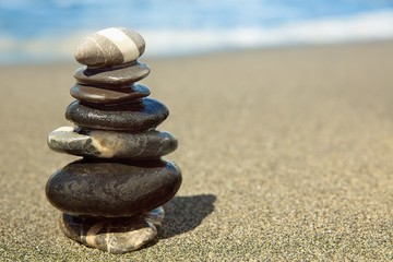 Fototapeta na wymiar Concept of balance and harmony. Rocks on the coast of the Sea in the nature