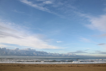 View of the ocean and clouds at the beach