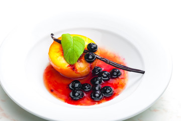 detail of caramelized peach with blueberries