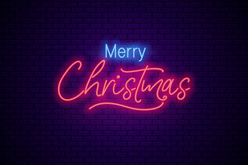 Christmas neon greeting sign on dark brick background.