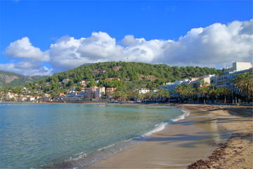 Naklejka na ściany i meble Deserted beach of the island of Palma de Mallorca during the low fall season.