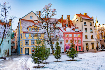 Picturesque street with colorful houses in the old town of Riga in winter at Christmas time, Latvia