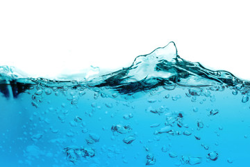 Water splash or water wave with bubbles of air on the background.