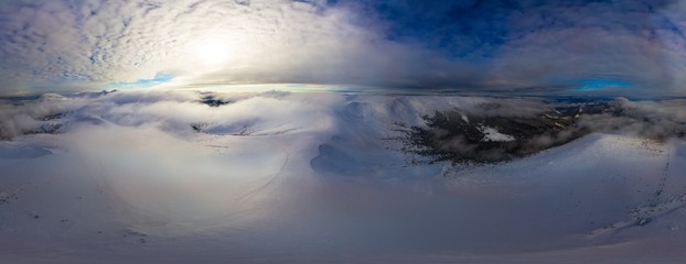 Aerial 360 view of the evening winter panorama
