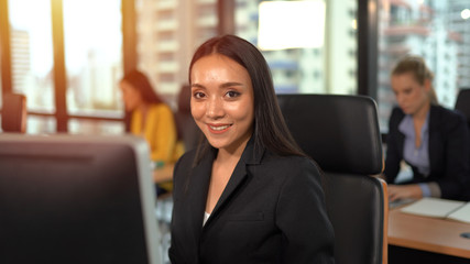 Business woman smiling on workplace