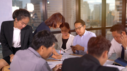 People discussing together in conference room