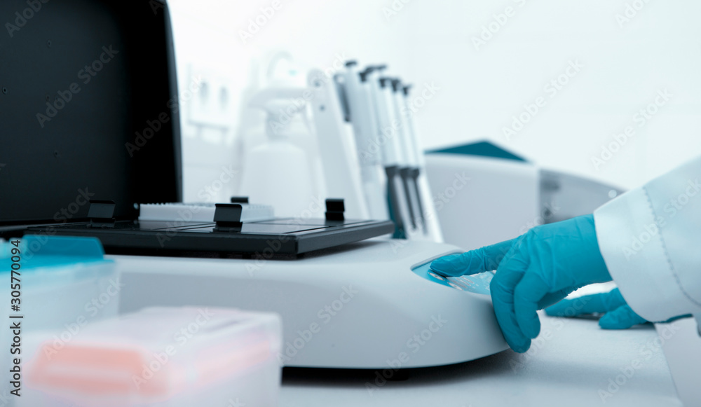 Poster Close up of machine for testing different samples