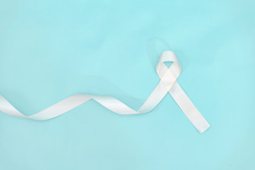 lung cancer awareness month with white ribbon. Healthcare and medicine concept.