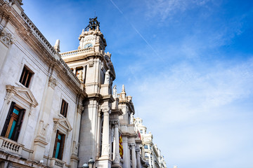 Facade of the Valencia City Council, from one of the corners, and with space for text and copy space of the blue sky.