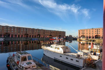 Boats moored in the Albert Dock, Liverpool on a beautiful sunny day