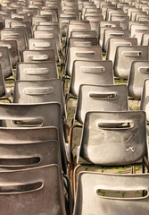 Fototapeta premium Vacant empty plastic chairs pattern