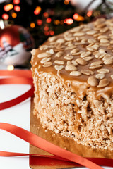 Cake with peanuts and caramel. Christmas family cake.