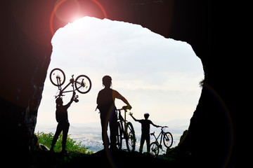 adventures of a group of friends reaching a cave by riding a mountain bike