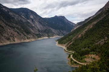 Obraz na płótnie Canvas Beautiful Aerial View of Carpenter Lake during a cloudy summer day. Located between Gold Bridge and Lillooet in the interior British Columbia, Canada.
