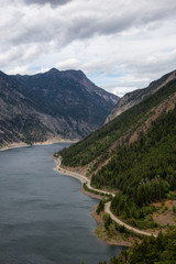 Fototapeta na wymiar Beautiful Aerial View of Carpenter Lake during a cloudy summer day. Located between Gold Bridge and Lillooet in the interior British Columbia, Canada.