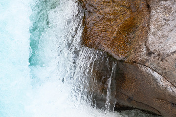 rocky bed of river, fast mountain stream with roiling stream. journey to nature in water valley