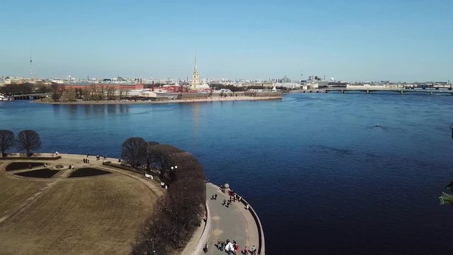 Aerial of an Old Saint Petersburg buildings and Rostral Columns, Russia, travelling and tourism concept. Stock footage. Breathtaking landscape of the city built on Neva river.