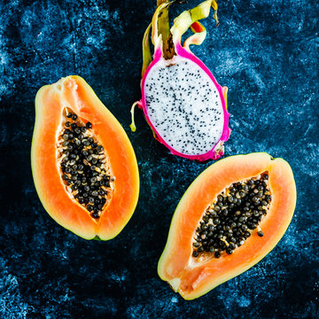 Papaya and dragon fruit on a table