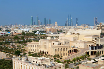 Obraz premium Stunning Aerial View of Isa Cultural Centre with a Group of Iconic Landmarks in the Backdrop, Manama, Bahrain