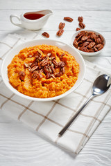 mashed sweet potato topped with pecan nuts
