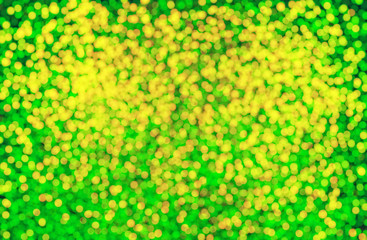 Abstract sparkling green background. Bokeh background.