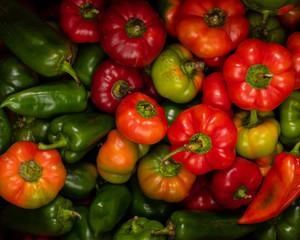 Ripe Green and Red Peppers Background