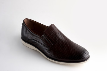 Men fashion brown shoe loafer isolated on a white background.