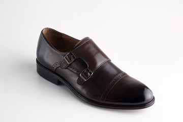 Men fashion brown shoe loafer isolated on a white background.