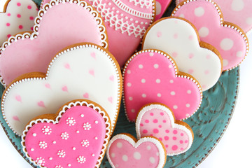 Set of pink heart shaped cookies with patterns, handmade