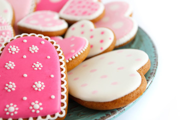 Set of pink heart shaped cookies with patterns, handmade