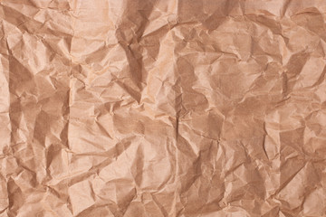 The texture of crumpled brown crumpled paper