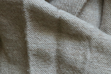 plain woolen beige fabric as background