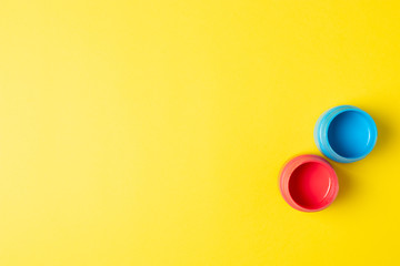 Set of paints for painting on an yellow background