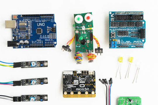 Minsk, Belarus. November, 2019. The BBC robot Micro Bit is near the robot. It can be programming on Scratch and Python. Creative. Connected. Coding. Learning, teaching easy and fun. Free space text.
