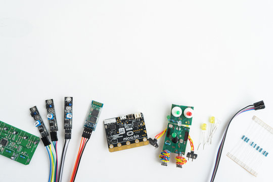 Minsk, Belarus. November, 2019. The BBC robot Micro Bit is near the robot. It can be programming on Scratch and Python. Creative. Connected. Coding. Learning, teaching easy and fun. Free space text.