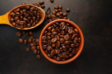 coffee beans on stone background, close-up