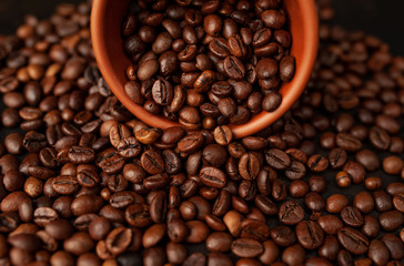 coffee beans on stone background, close-up