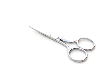 Pair of silver scissor on white background.