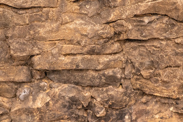 Abstract background texture of Old wall stone of a water Russian destroyed mill