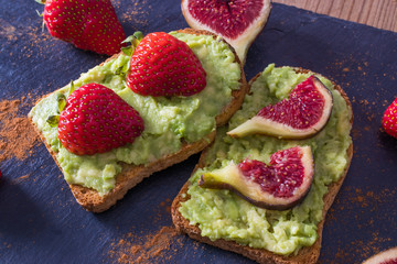 avocado or guacamole toast with berries