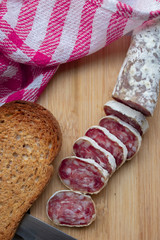 meat sausages on wooden table top view