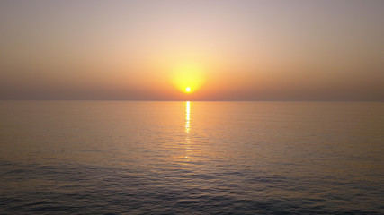 Amazing sunset over sea. Summer sunset seascape.