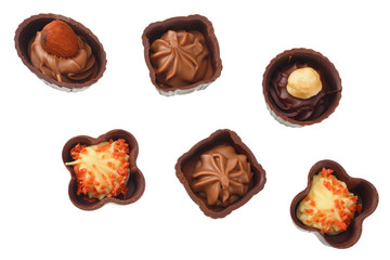 Chocolate pralines isolated on a white background. top view