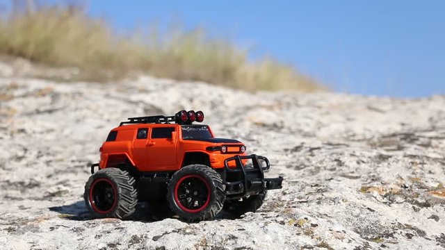 toy rc car riding on a cliff